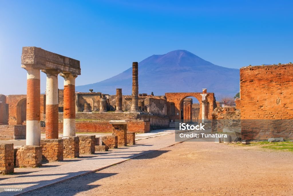 Pompeii, Campania, Naples, Italy - ruins ancient city buried under volcanic ash in the eruption of Mount Vesuvius in AD 79. Pompeii, Campania, Naples, Italy - ruins of an ancient city buried under volcanic ash and pumice in the eruption of Mount Vesuvius in AD 79. Pompeii Stock Photo