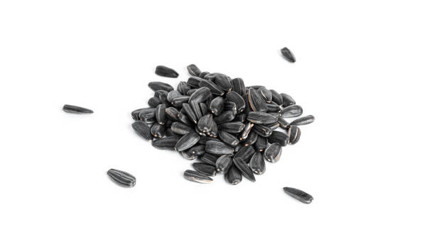 istock Sunflower seeds isolated on a white background 1388916216