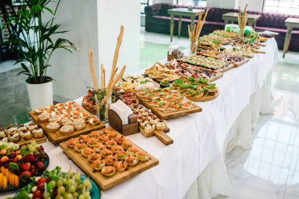 istock Snacks set. Wooden boards plates with different delicious snacks. Appetizers table with Italian antipasti snacks. Authentic traditional Spanish tapas set. 1388916464