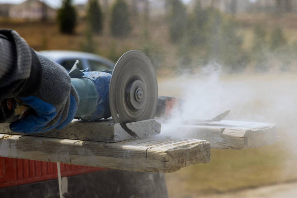 istock Dust from cutting marble stone with an electric grinder - diamond blade 1388916760