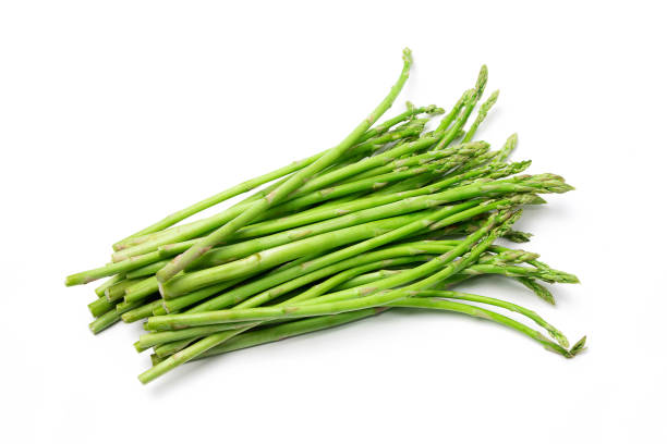istock Group of Asparagus isolated on white background. 1388917483