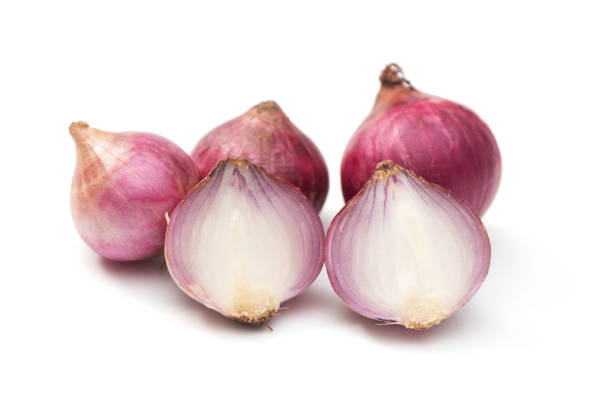 istock Red onion on a white background, Slide and half onion, Allium ascalonicum. 1388917511