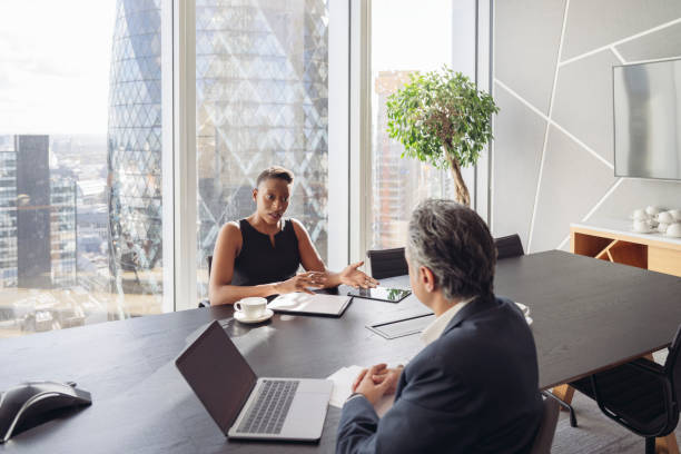 istock Financial partners discussing strategy in modern office 1388921703