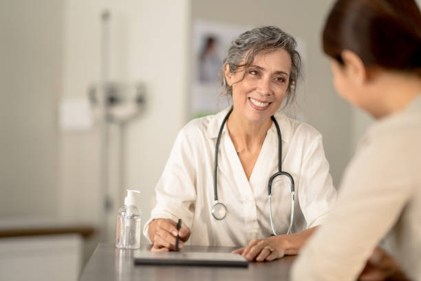 istock Doctor Meeting with a Female Patient 1388924768