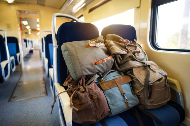 istock Few backpacks on the train seat 1388924957
