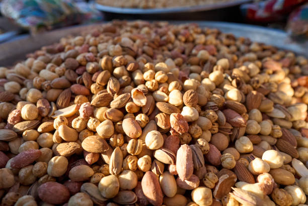 istock Mix of different nuts and seeds. Snacks at the oriental bazaar. 1388926216