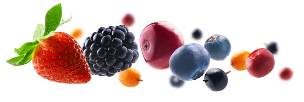 istock Many different berries in the form of a frame on a white background 1388926881