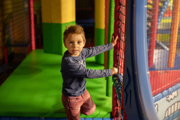 istock Child Plays in Play Center 1388927012
