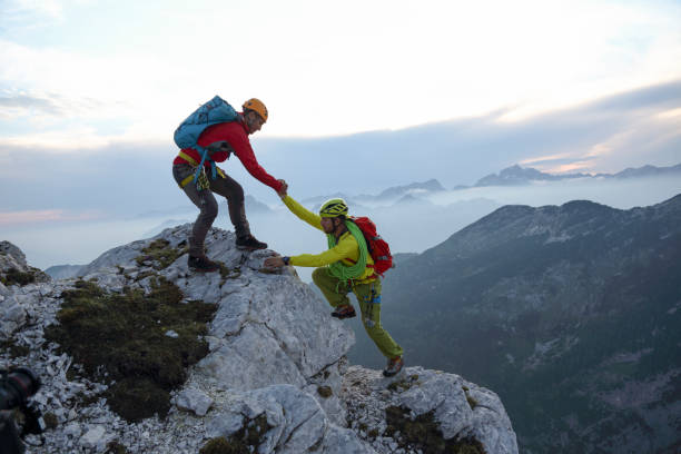 istock Helping hand in the mountains 1388927099