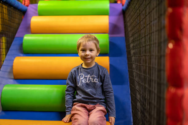 istock Child Plays in Play Center 1388927158