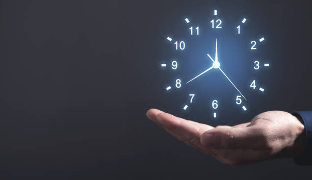istock Male hand showing clock. Time Management 1388927212