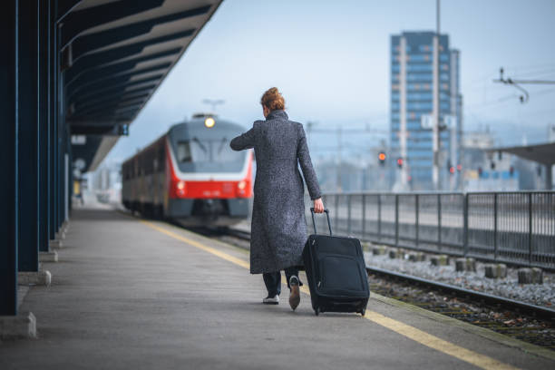 istock Business Woman Catching the Train 1388927248