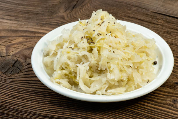 istock Homemade pickled sauerkraut on a white plate 1388927428
