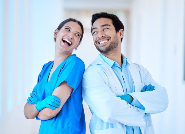 istock Shot of a young dentist with his assistant 1388931828
