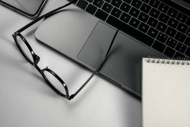 Mobile phone, laptop, eyes and mobile phone on white background board