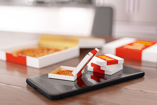 Online Food Delivery Concept with Pizza Boxes on Smart Phone. 3D Render