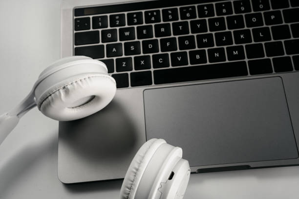 istock Headphones, laptops and shopping carts 1388932863