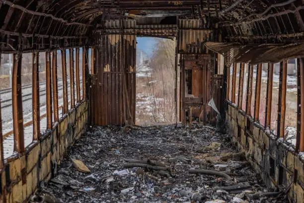 Burnt out train car or waggon interior. Old railcar after being set on fire. All the interior is burnt and unrecognisable.