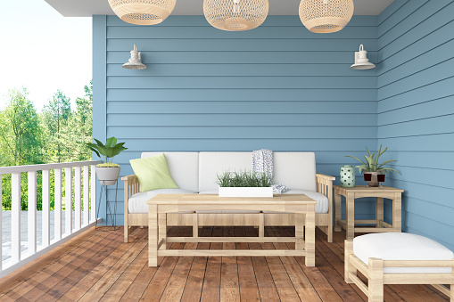 Acogedora terraza con muebles de bambú photo