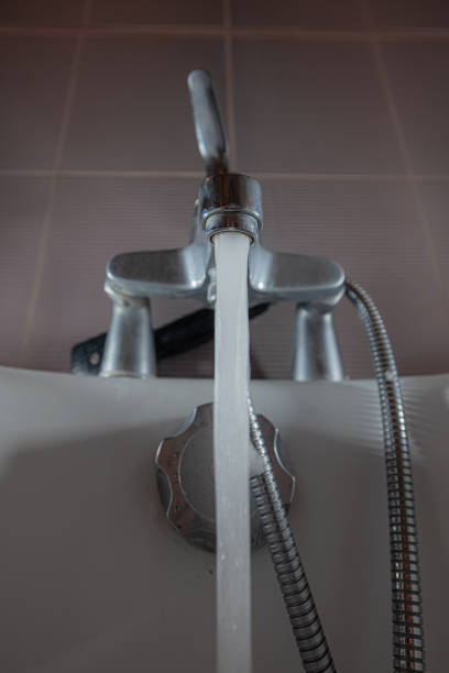 istock Faucet or water pipe outlet in a bath tub is visible with water 1388937455