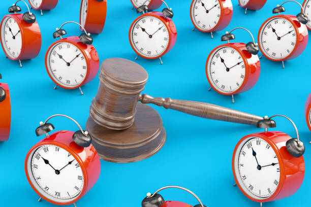 istock Judge Gavel and Alarm Clock 1388937636