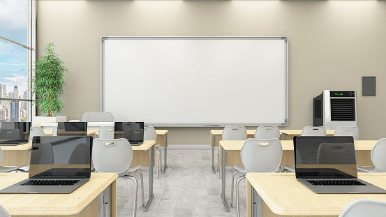 Modern Classroom with a Blank White Board and Laptops on Desks. 3D Render