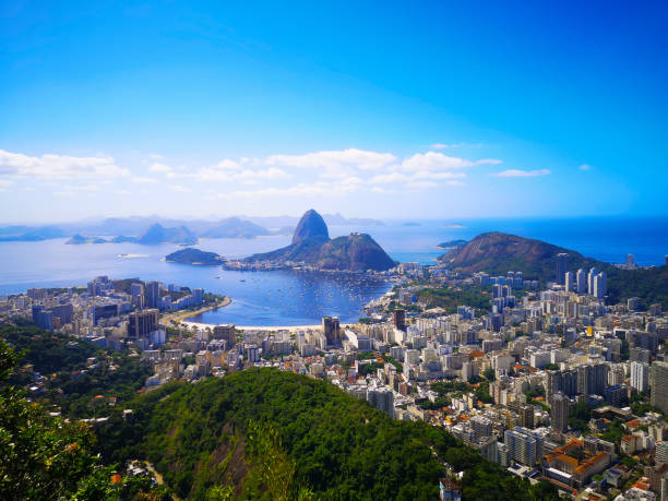Rio Panoramic view of Rio de Janeiro with Sugarloaf and Guanabara bay in the centre copacabana rio de janeiro stock pictures, royalty-free photos & images