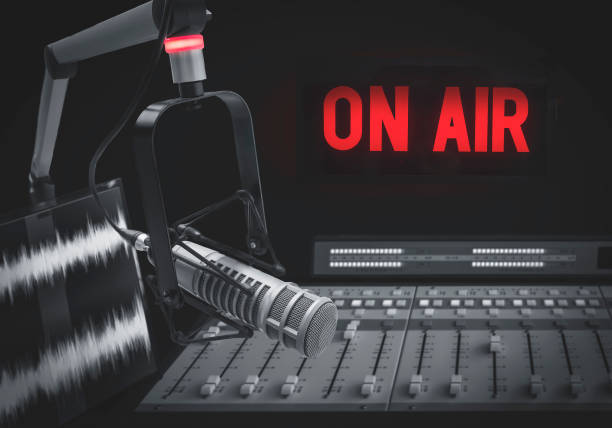 istock Professional microphone and on air sign 1388940090