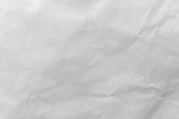istock White color eco recycled kraft paper sheet texture cardboard background. 1388940091