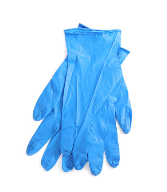 par de guantes médicos aislados en blanco, vista superior - surgical glove fotografías e imágenes de stock