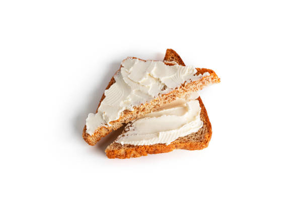 istock Bruschetta with cream cheese and vegetables isolated on a white background. Toasts and coffee isolated. Sandwich isolated. Sandwich with vegetables and cheese 1388948331