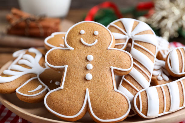 istock Delicious gingerbread Christmas cookies on plate, closeup 1388948345