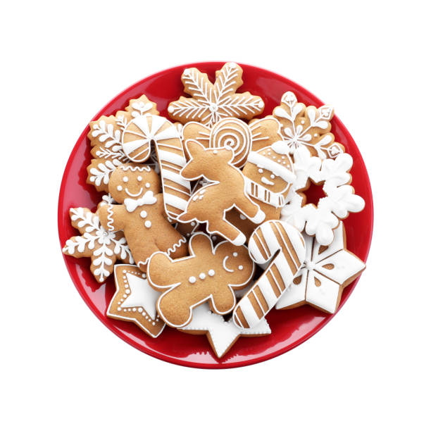istock Delicious gingerbread Christmas cookies on white background, top view 1388948565