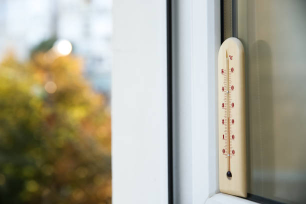 istock Weather thermometer on outside window. Space for text 1388949769