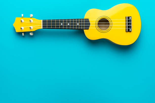 istock Overhead photo of ukulele with copy space 1388955760
