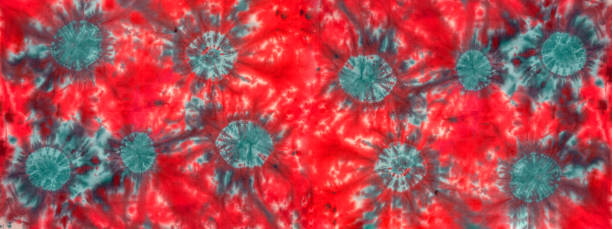 Abstract colorful art design batik spiral swirl shibori technology tie dye batic pattern textile fabric texture background banner, with circles in complementary colors green red