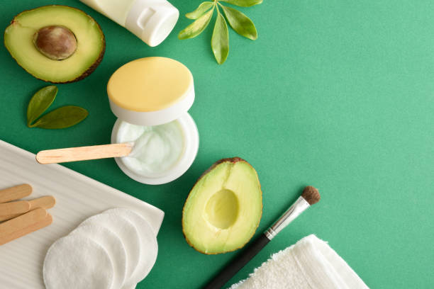 istock Cream and lotion with avocado for skin care and tools 1388966010