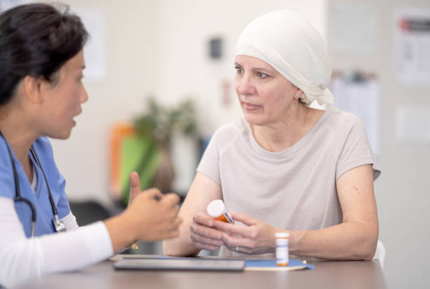istock Nurse Meeting with a Cancer Patient 1388967404