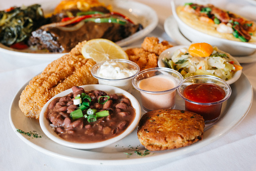 Catfish, Fantail Shrimp, Salmon Croquettes, Smothered Cabbage, Red Beans