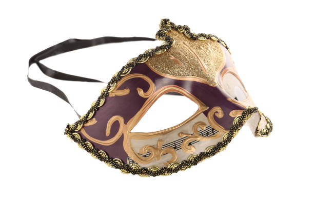 istock Beautiful purple carnival mask isolated on white 1388967657