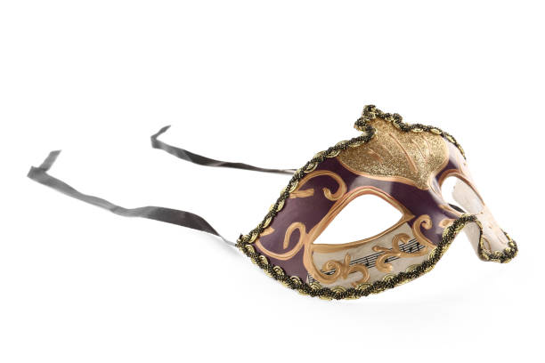 istock Beautiful purple carnival mask isolated on white 1388967664