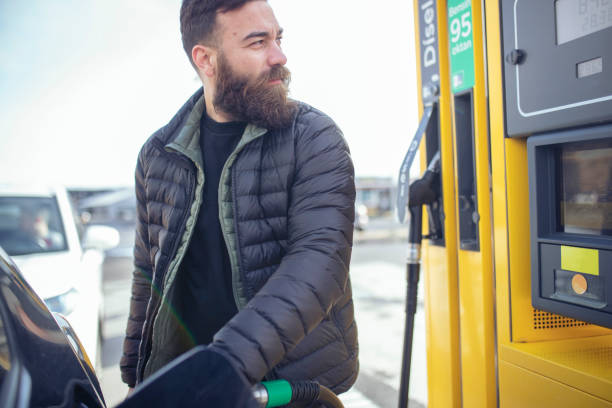istock A hipster man at a gas station. ISL 1388971769
