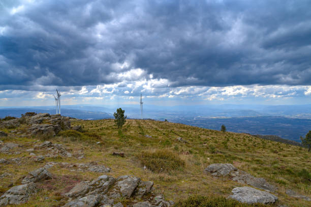 istock between the mountain and the sky a wind farm 1388972412