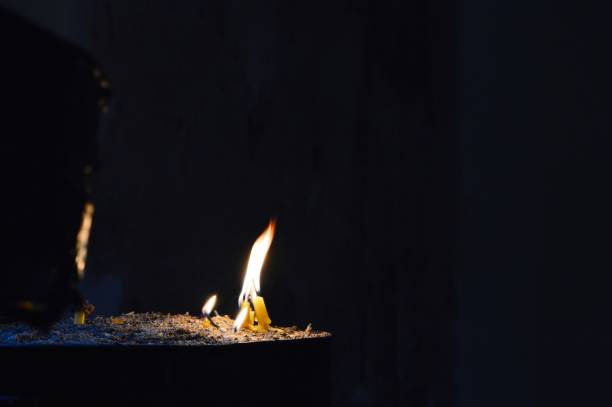 istock candles lit in the church 1388973893