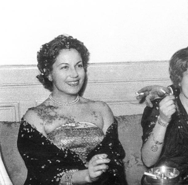istock Young woman at party. 1955. 1388976664