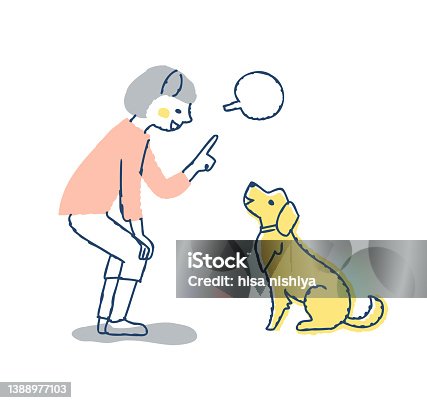 istock Young woman saying command to dog 1388977103
