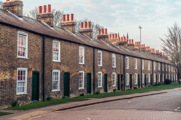 istock Row of red brick terraced houses 1388983440