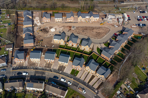Aerial view looking down on new build housing site in England, UK