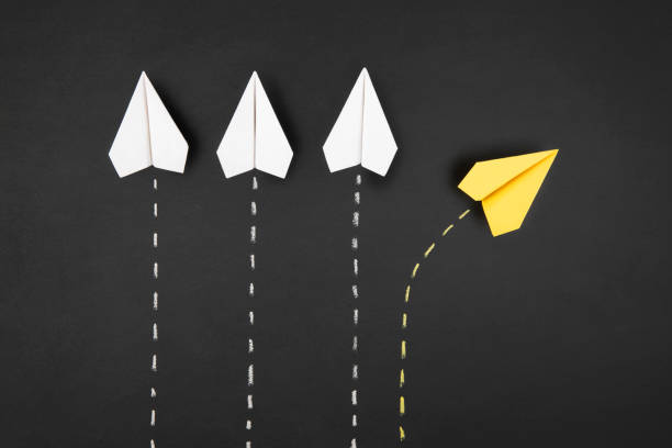 istock Individuality Concept with Paper Airplanes 1388987390