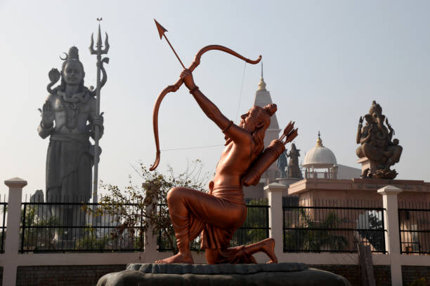 istock Statue in temple with bow and arrow 1388988193